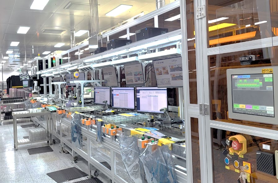 On-site photo of the LCD bonding assembly and inspection line