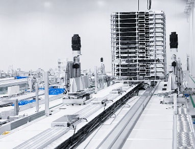 On-site photo of the OHCV low-vibration line for large OLED TV frames